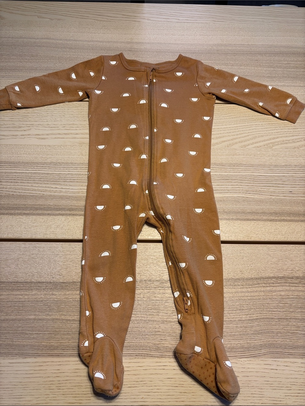 Petit Lem Rust Brown Footed One-Piece with White Sun Motif